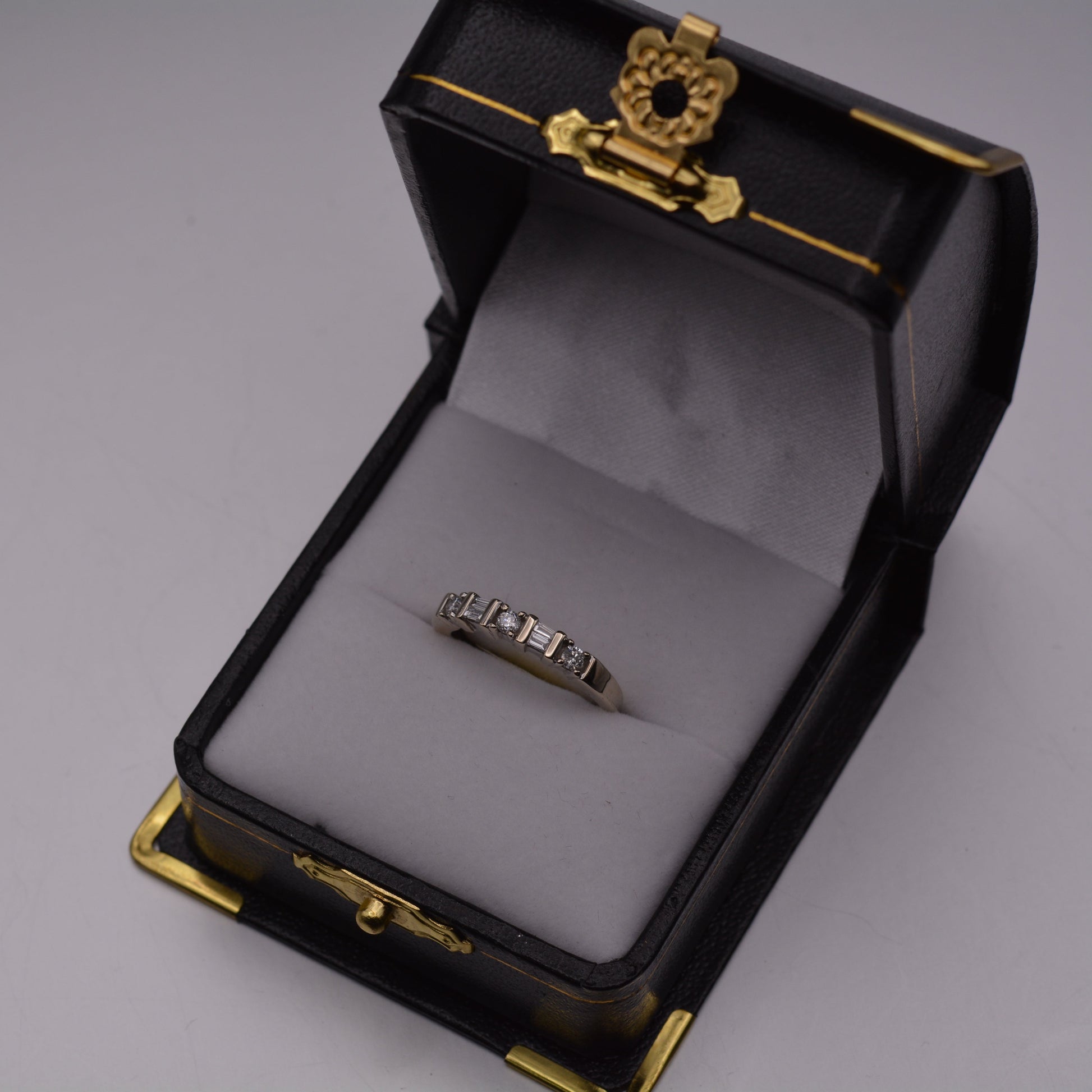 14KT Round and Baguette Diamond Ring