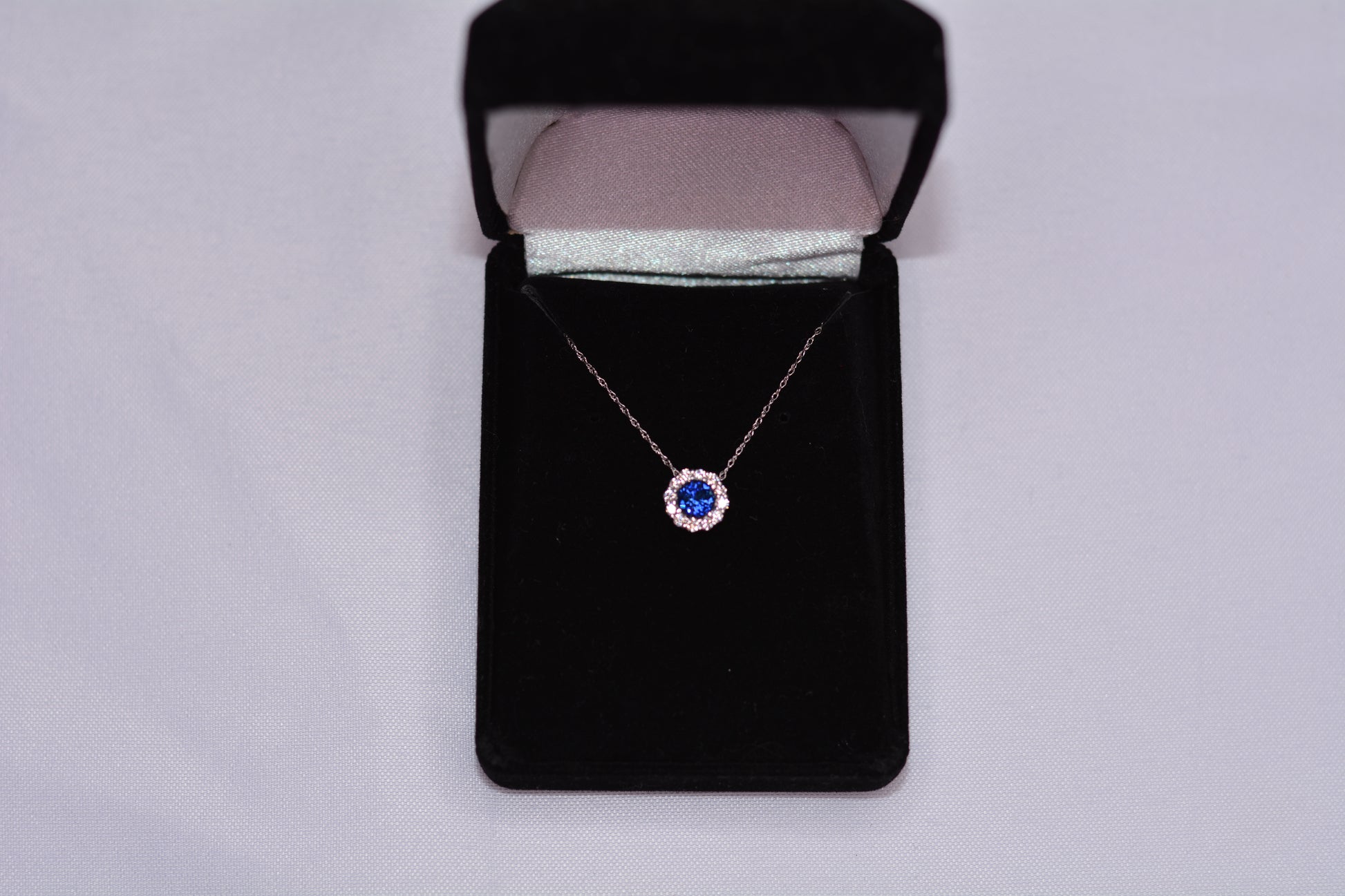 14KT White Gold Sapphire Pendant with Diamond Halo