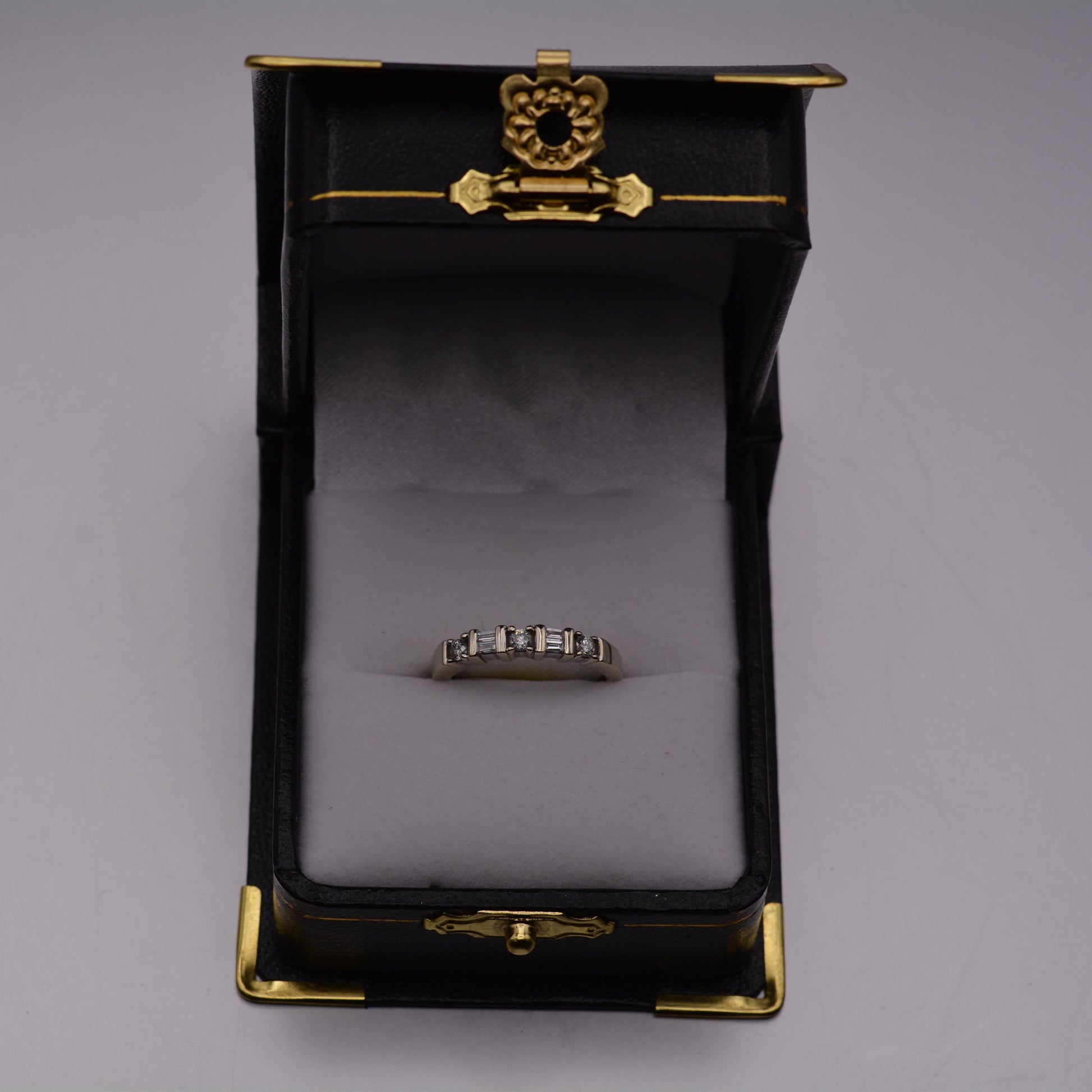14KT Round and Baguette Diamond Ring